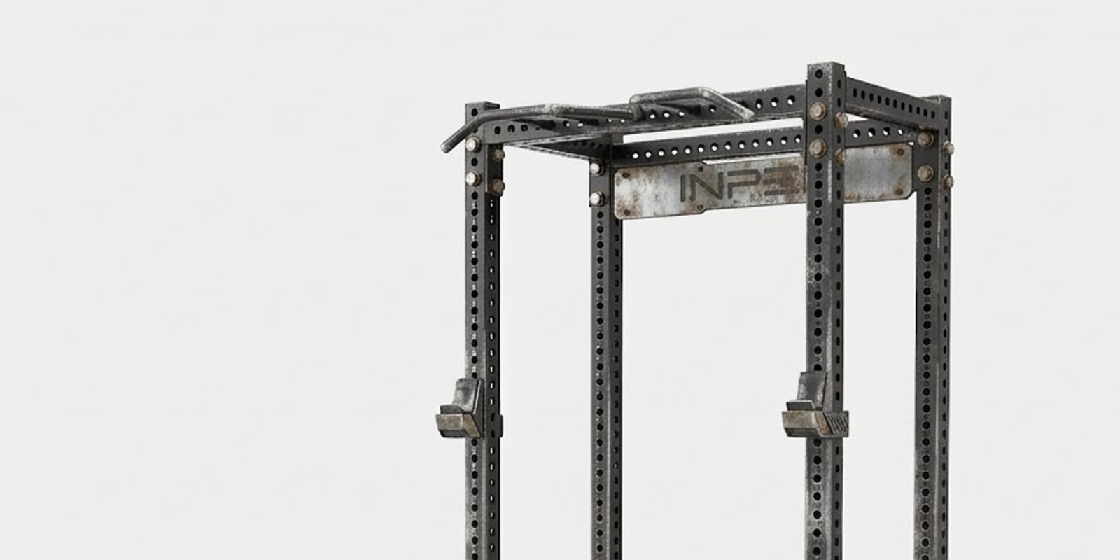 Black and white image of a worn out gym equipment frame showing fading paint and wear