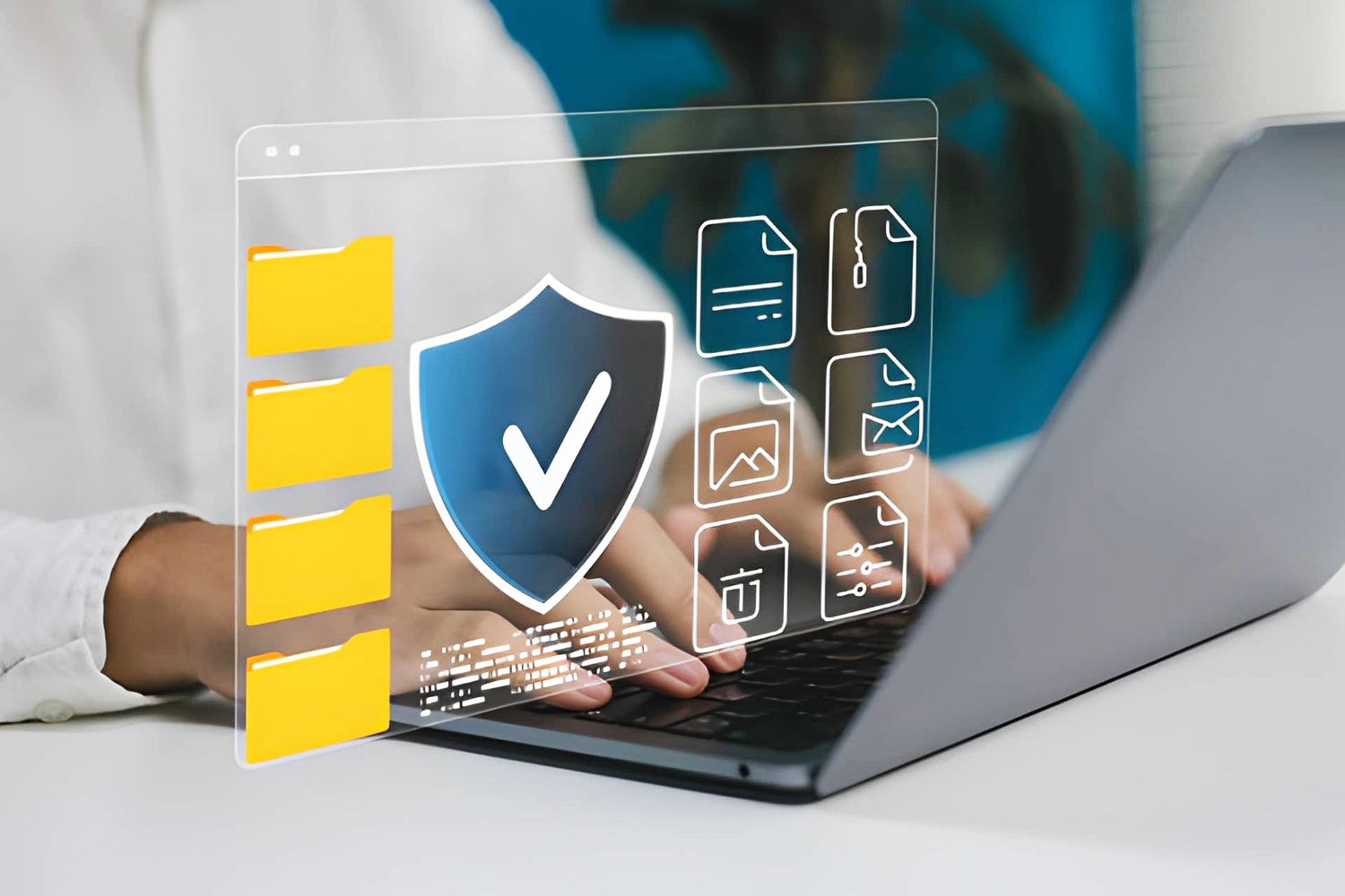 Person typing on laptop with digital shield and folders overlay