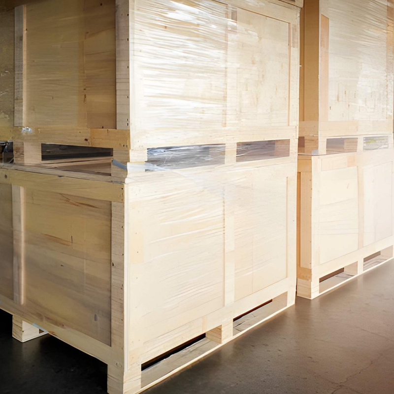 Large wooden export crates stacked in warehouse
