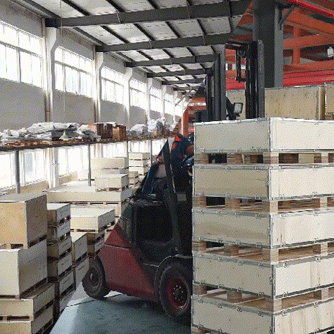 Large wooden export crates stacked in warehouse